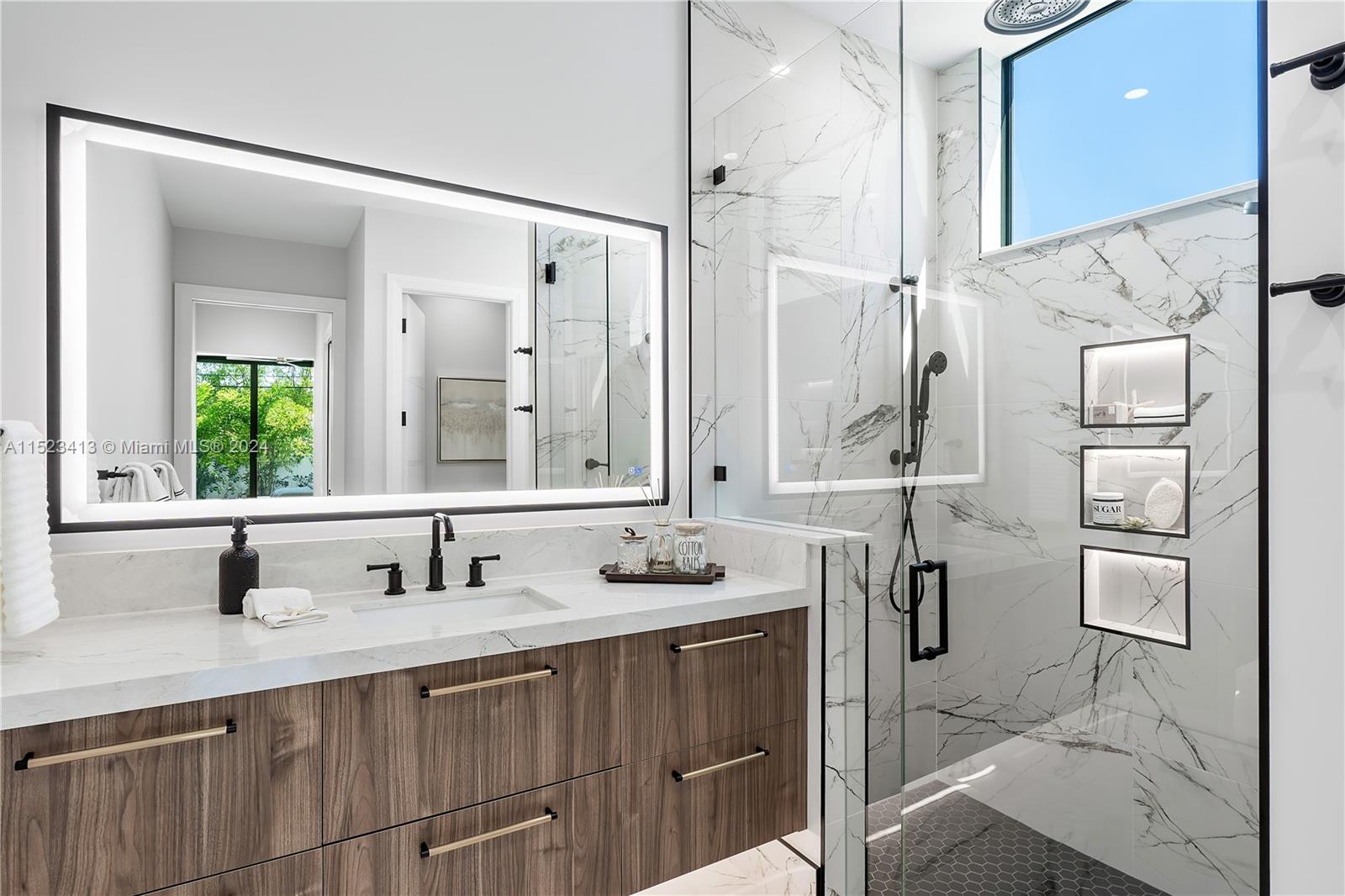 364 Northeast 6th Street Boca Raton, FL 33432 - Photo 29 of 80 a bathroom with a sink and a mirror