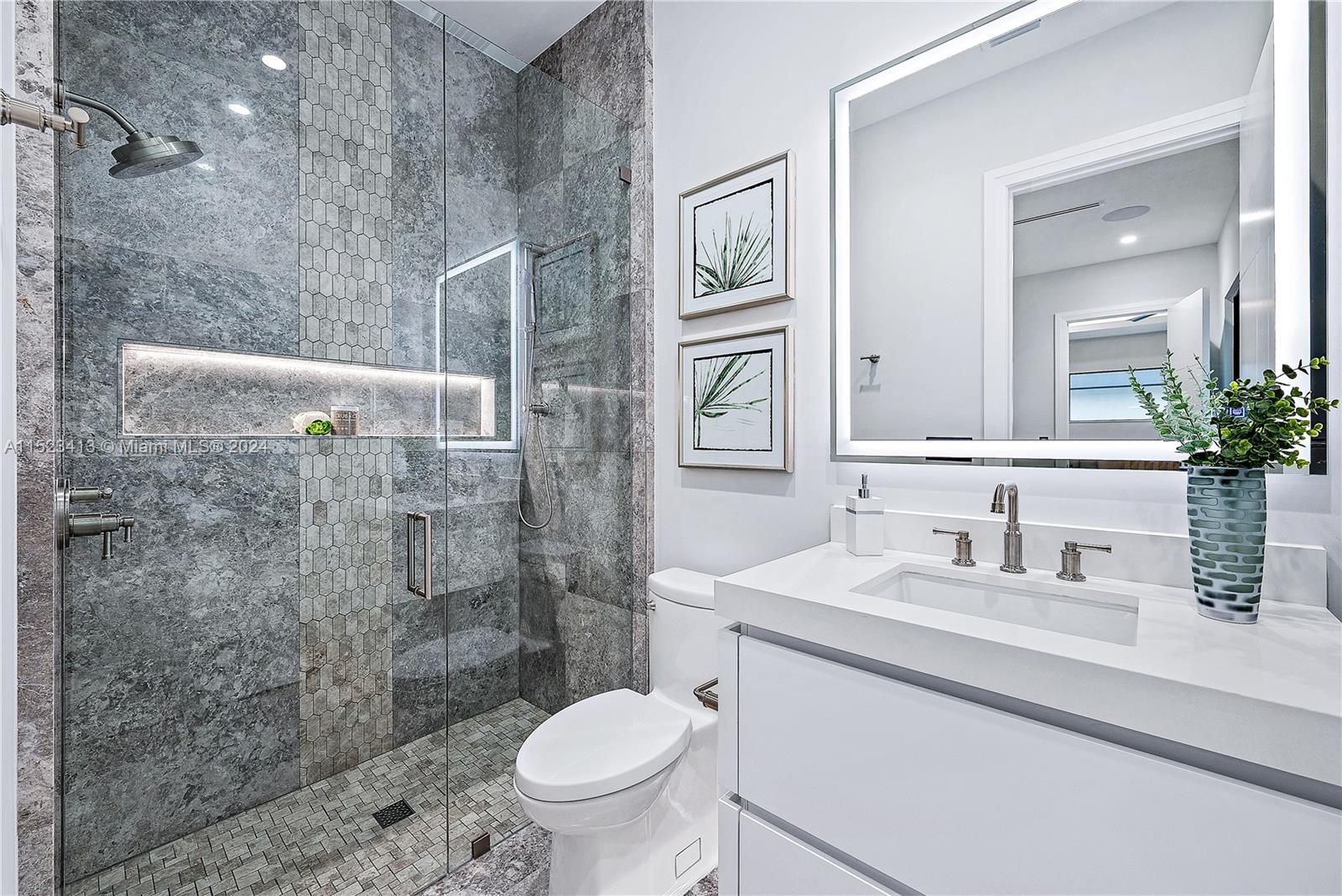 364 Northeast 6th Street Boca Raton, FL 33432 - Photo 44 of 80 a bathroom with a sink toilet and shower