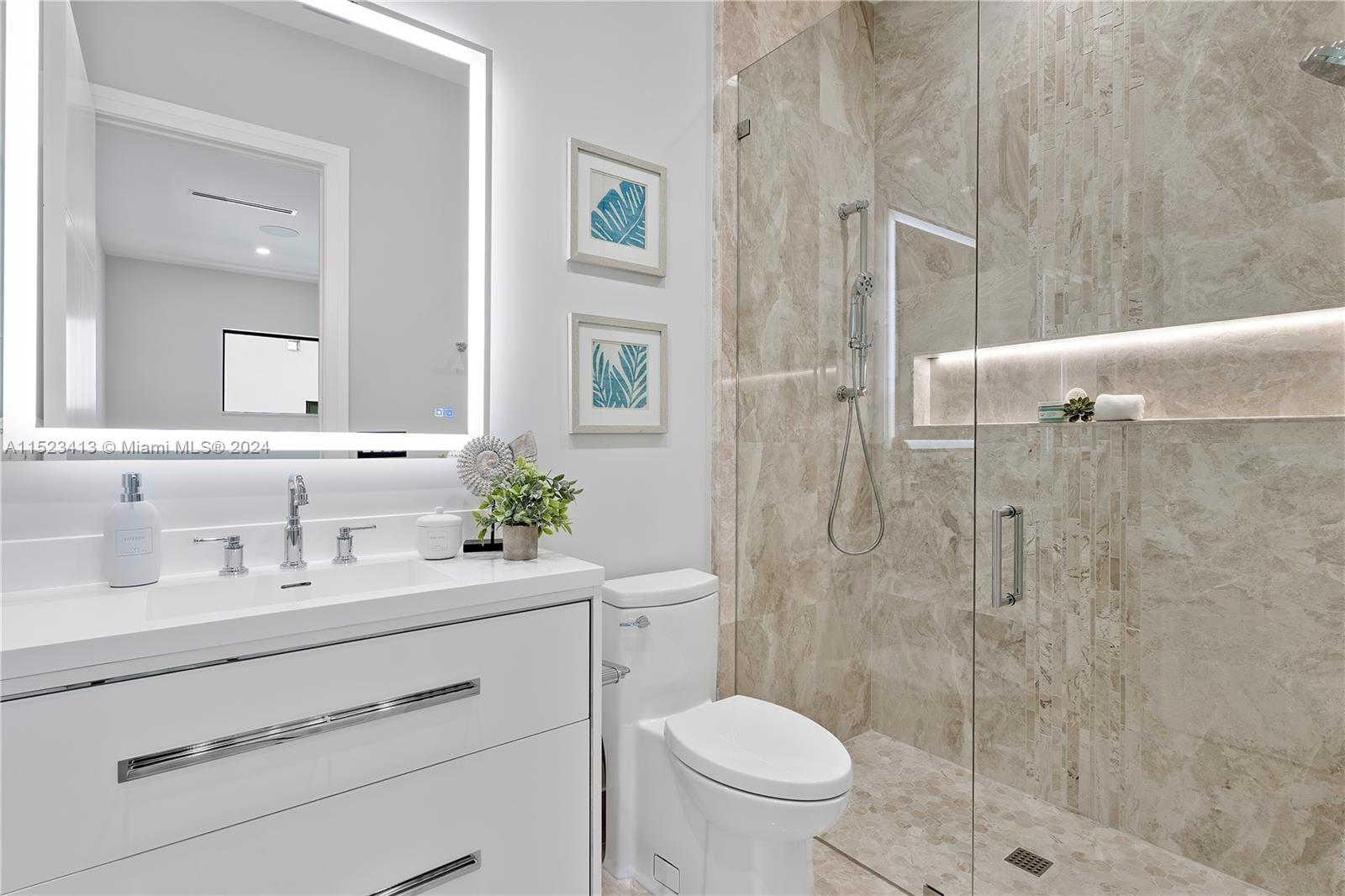 364 Northeast 6th Street Boca Raton, FL 33432 - Photo 47 of 80 a bathroom with a sink toilet and shower