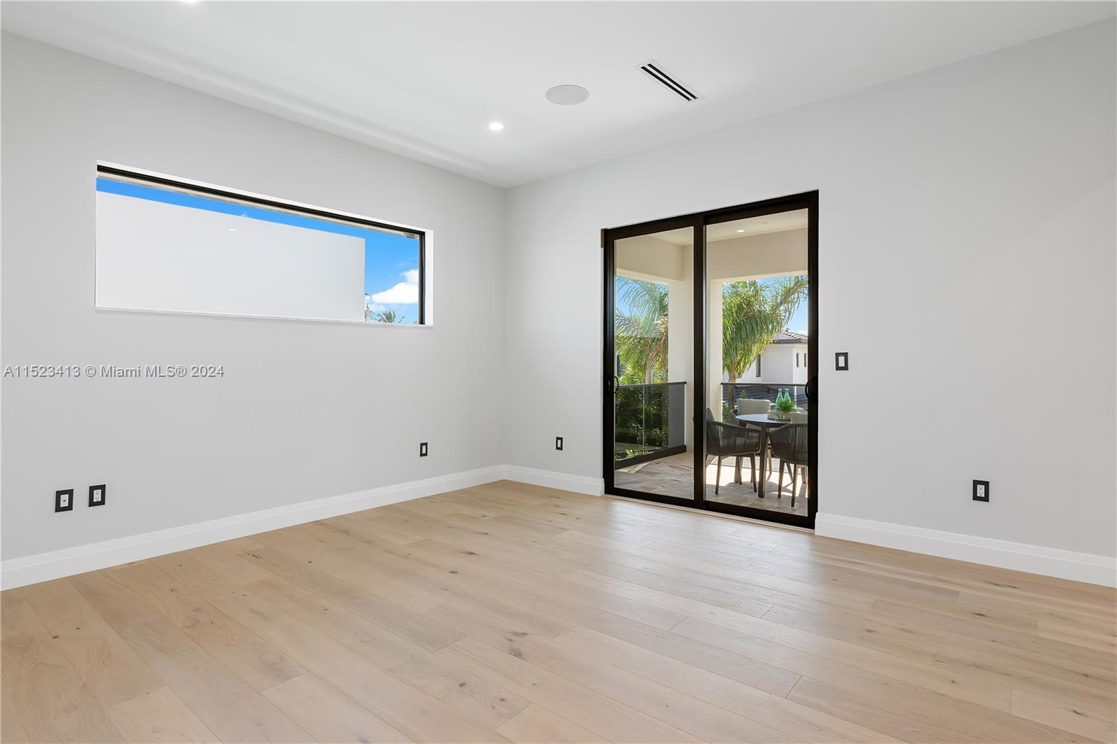 364 Northeast 6th Street Boca Raton, FL 33432 - Photo 48 of 80 a view of an empty room with glass door
