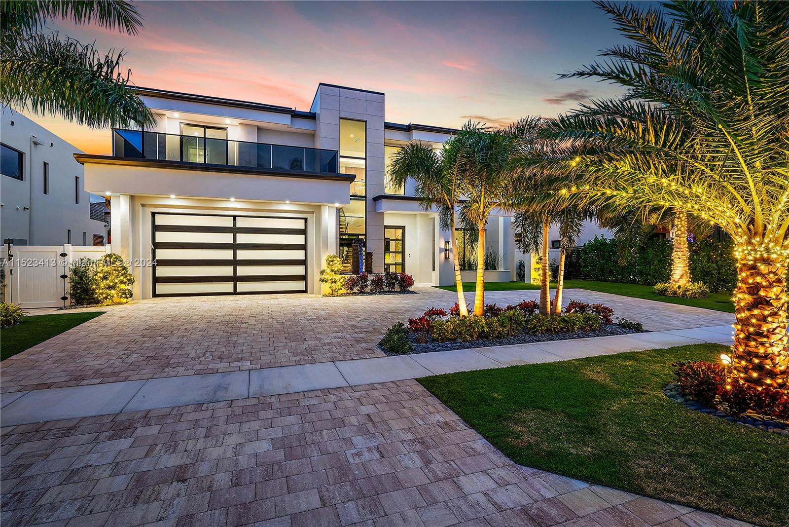 364 Northeast 6th Street Boca Raton, FL 33432 - Photo 54 of 80 a front view of a house with a yard