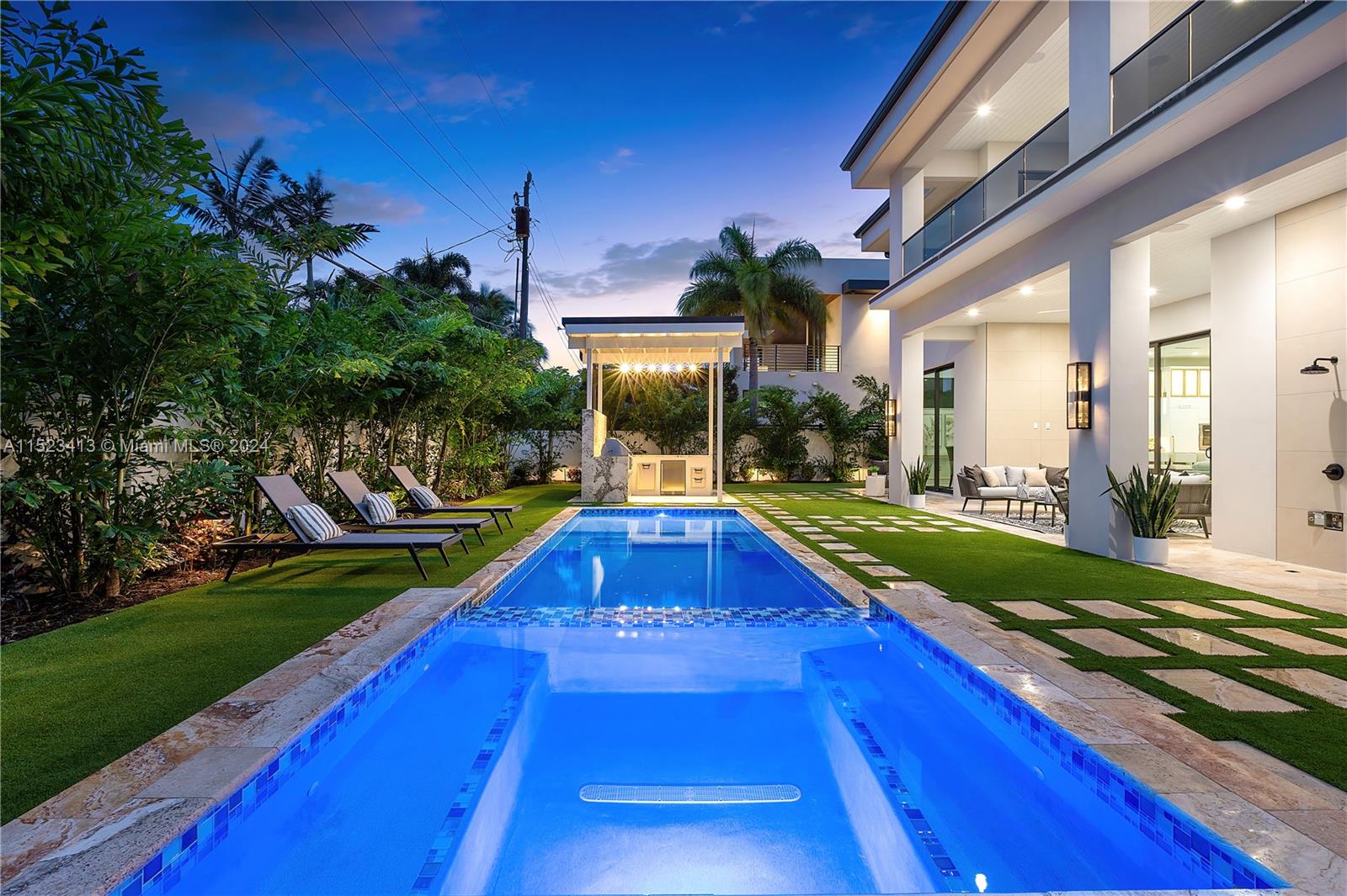 364 Northeast 6th Street Boca Raton, FL 33432 - Photo 63 of 80 a view of a house with swimming pool yard and patio