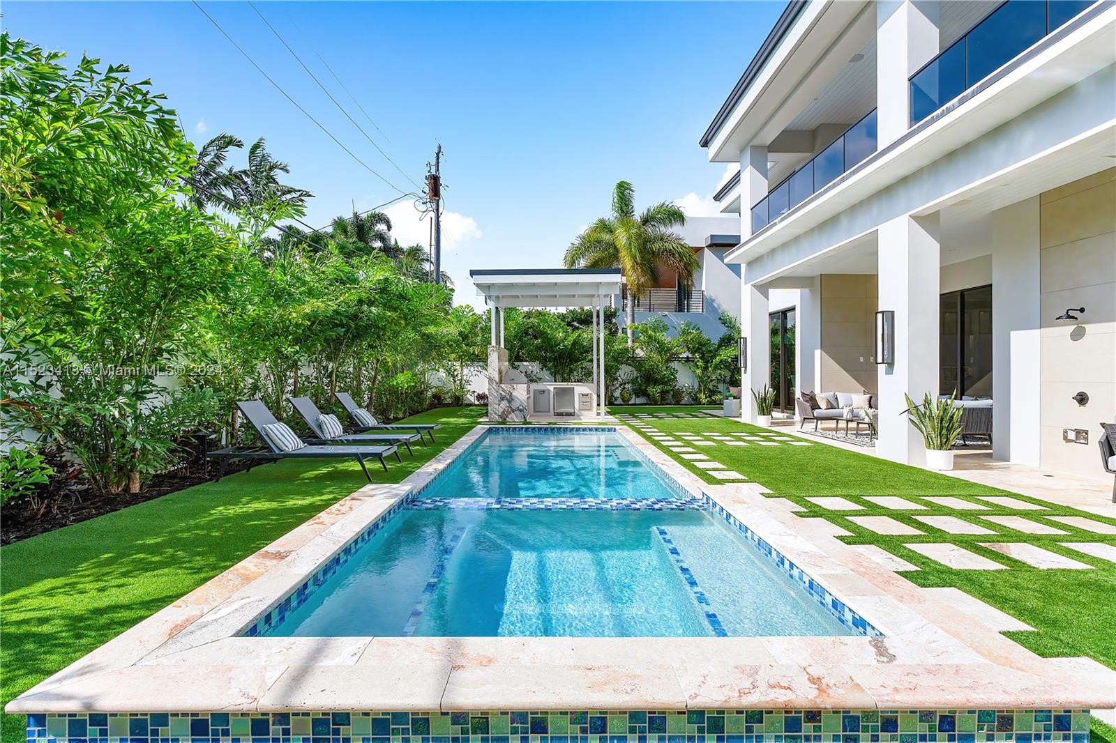 364 Northeast 6th Street Boca Raton, FL 33432 - Photo 69 of 80 a swimming pool with yard