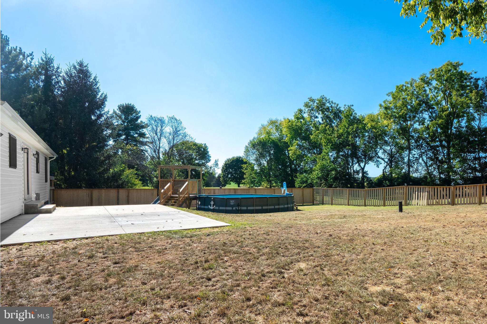 16809 Broadfording Road Hagerstown, MD 21740 - Photo 35 of 49 a swimming pool with trees in the background