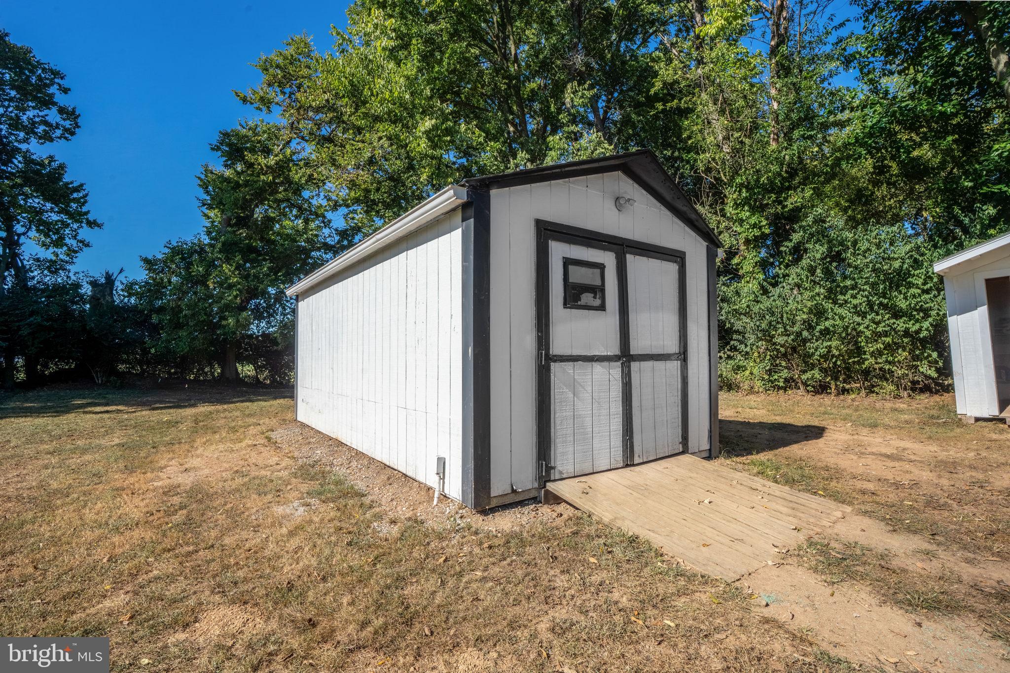 16809 Broadfording Road Hagerstown, MD 21740 - Photo 46 of 49 a backyard of a house with garage