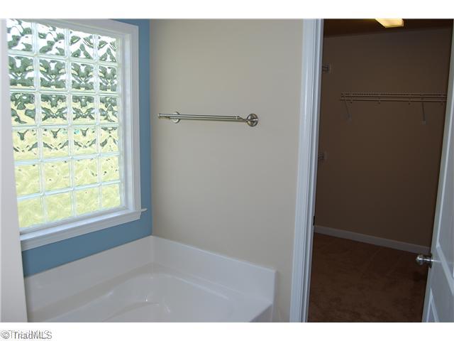 127 Mollie Road Harmony, NC 28634 - Photo 8 of 15 Master Bath/Spa. Large walk in closet! Seperate walk in shower.