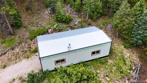 a view of a house with a mountain