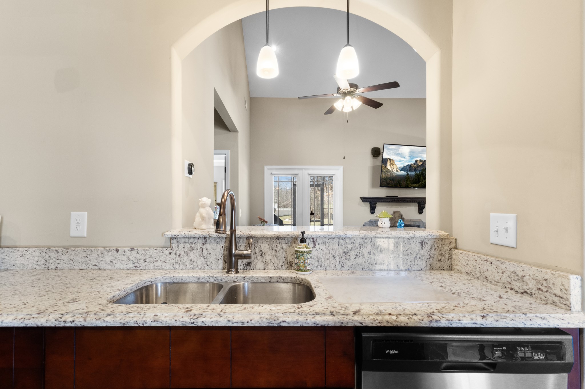 4268 Sango Road Clarksville, TN 37043 - Photo 13 of 32 a kitchen with a sink and a mirror