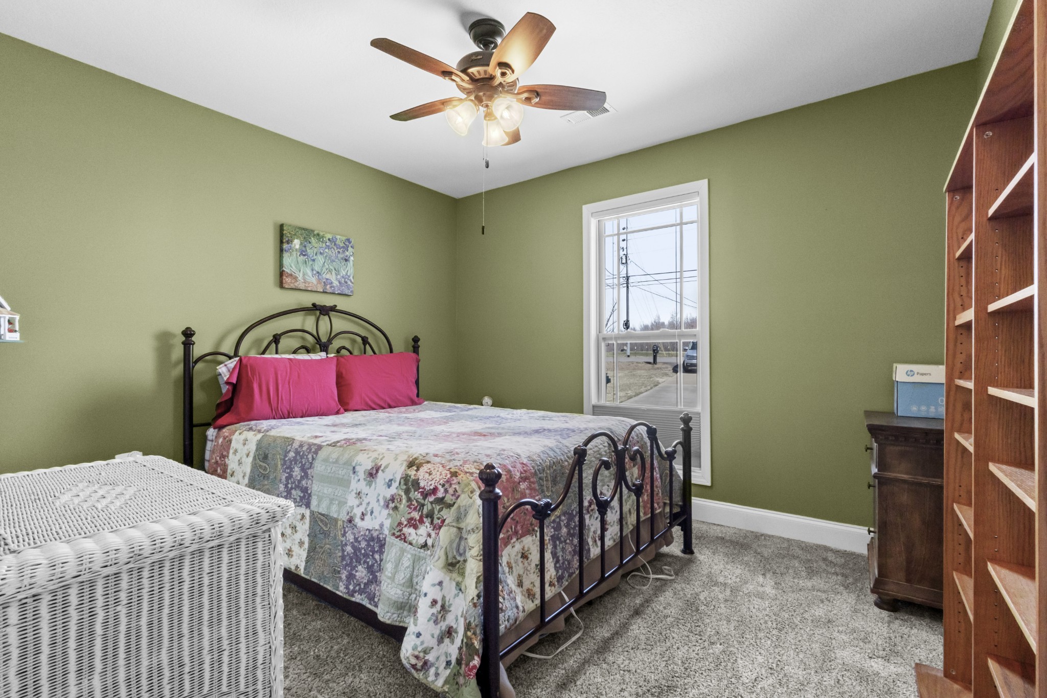 4268 Sango Road Clarksville, TN 37043 - Photo 18 of 32 a bedroom with a bed and a chandelier
