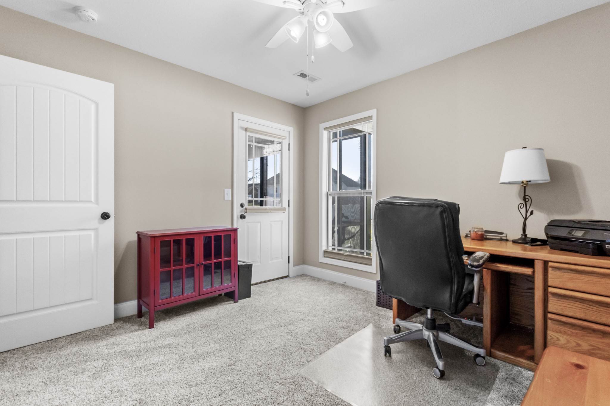 4268 Sango Road Clarksville, TN 37043 - Photo 20 of 32 a view of a workspace with furniture and a window