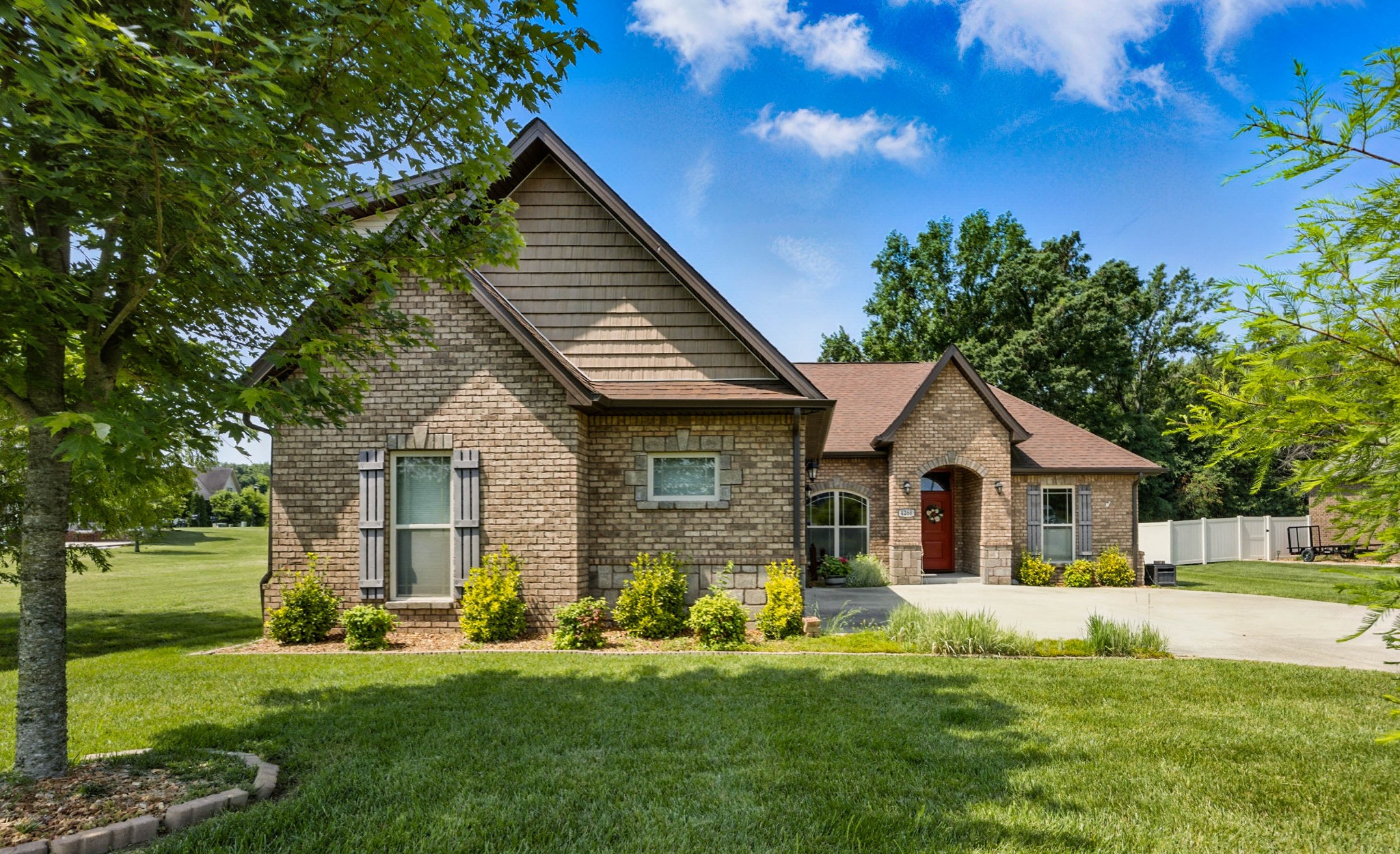 4268 Sango Road Clarksville, TN 37043 - Photo 2 of 32 a front view of a house with a yard