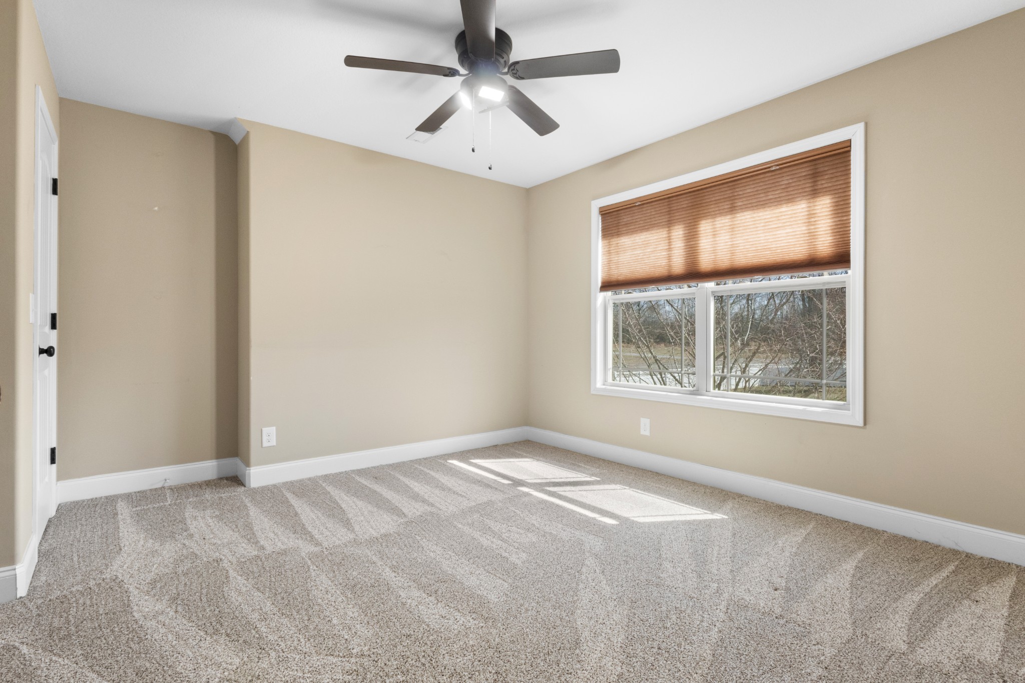 4268 Sango Road Clarksville, TN 37043 - Photo 23 of 32 a view of an empty room with a window