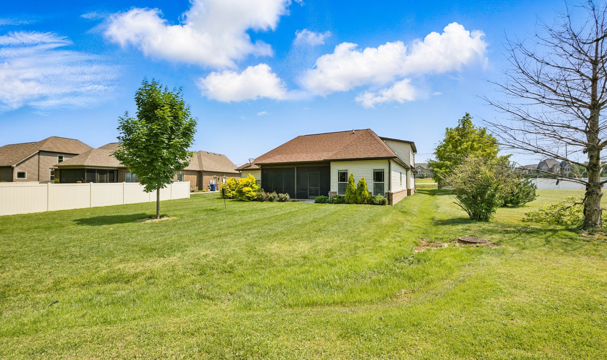 4268 Sango Road Clarksville, TN 37043 - Photo 30 of 32 a backyard of a house with lots of green space