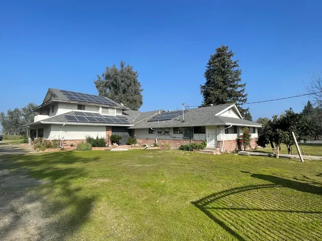 a view of a house with a big yard
