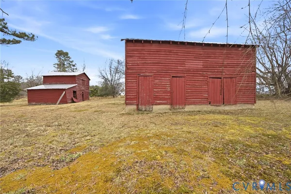 a view of a backyard of the house