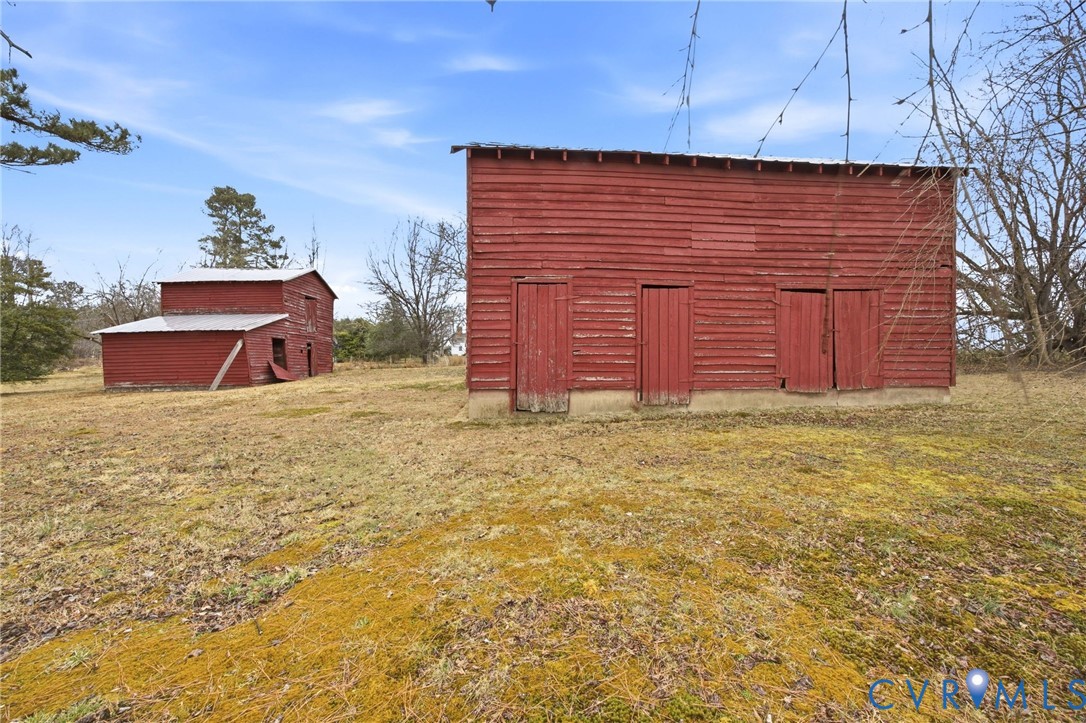 6184 Henderson Road Stony Creek, VA 23882 - Photo 17 of 30 a view of a backyard of the house