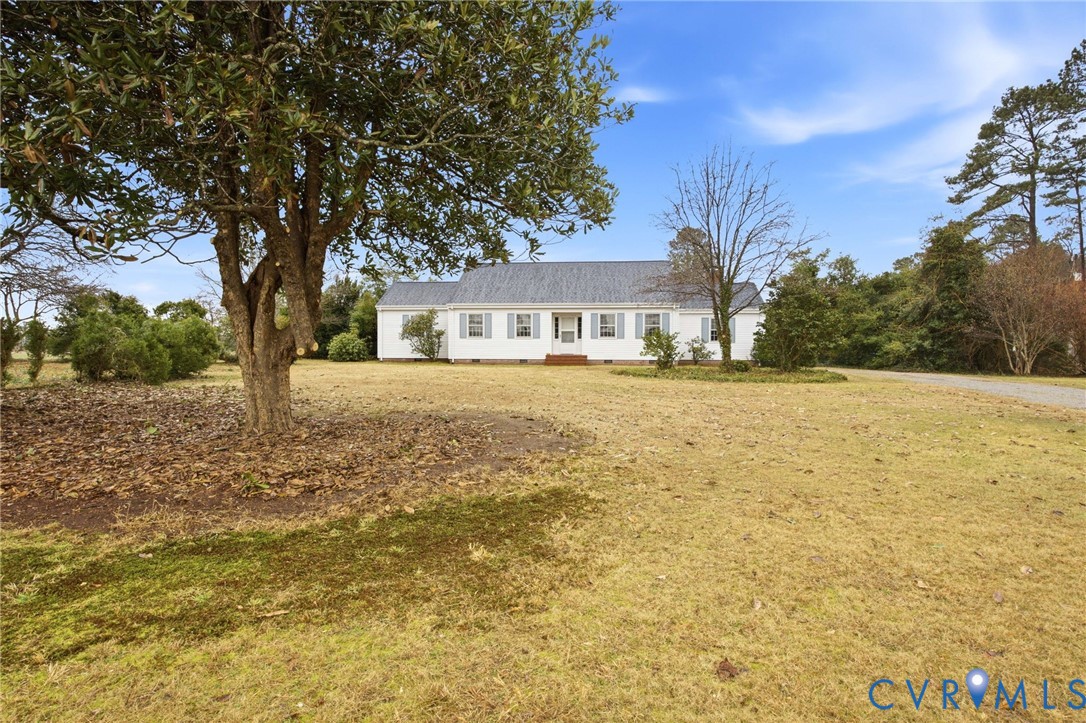 6184 Henderson Road Stony Creek, VA 23882 - Photo 24 of 30 a front view of a house with a yard