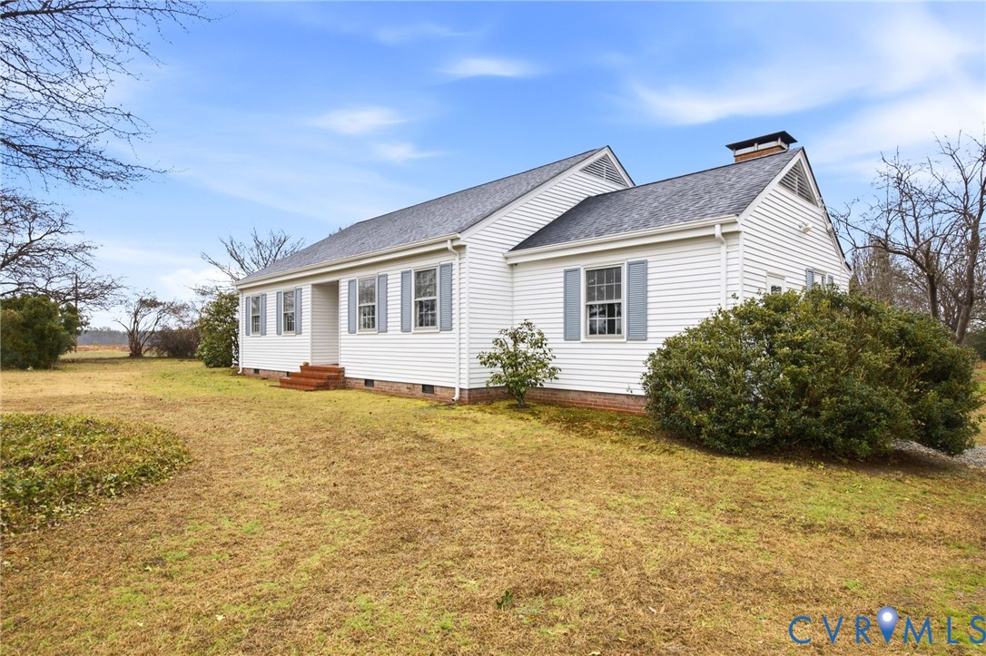 6184 Henderson Road Stony Creek, VA 23882 - Photo 5 of 30 a view of a house with a yard