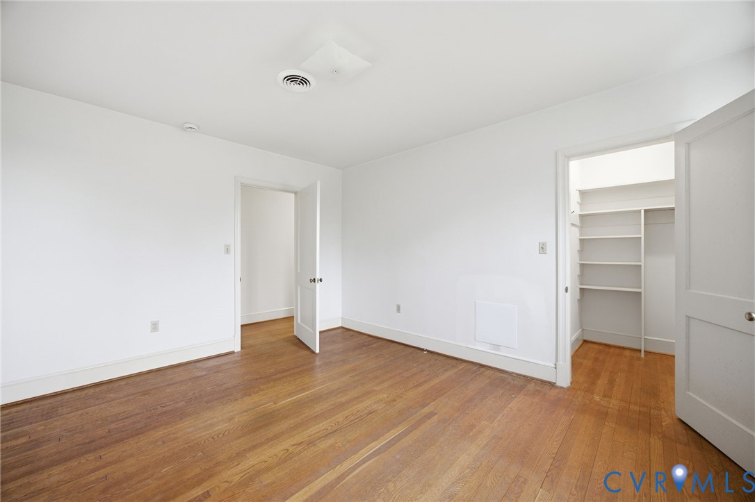 6184 Henderson Road Stony Creek, VA 23882 - Photo 8 of 30 a view of an empty room with wooden floor