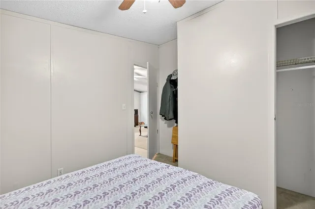 a balcony with table and chairs