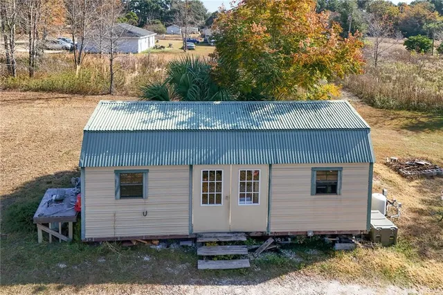 a view of a yard with an outdoor space
