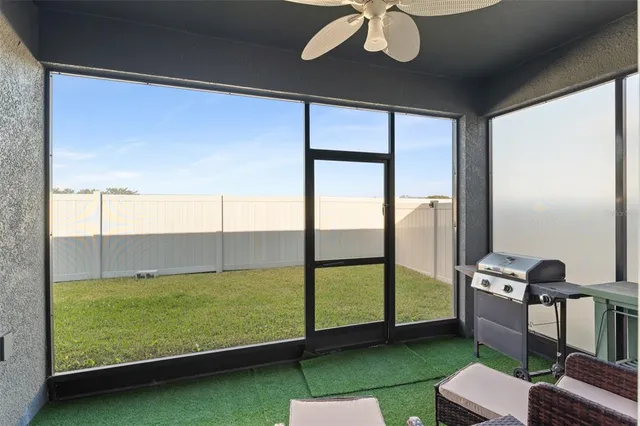 a view of an outdoor kitchen and a window