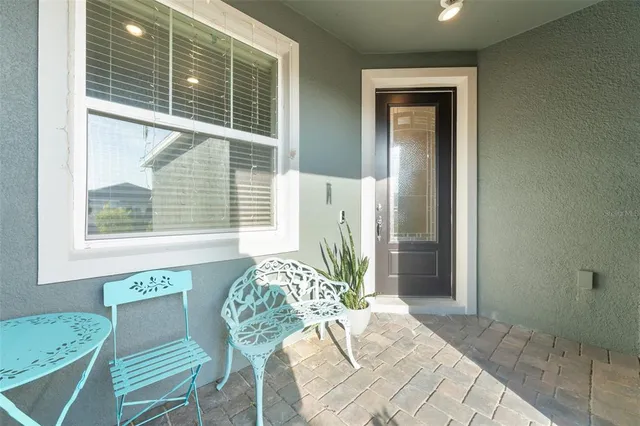 a view of a chair in a patio