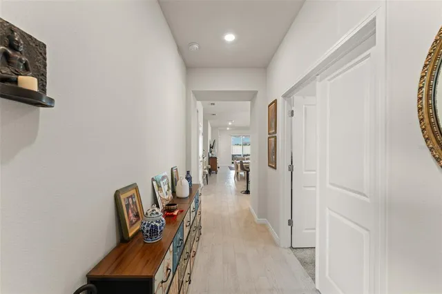 a hallway with a view of the entryway