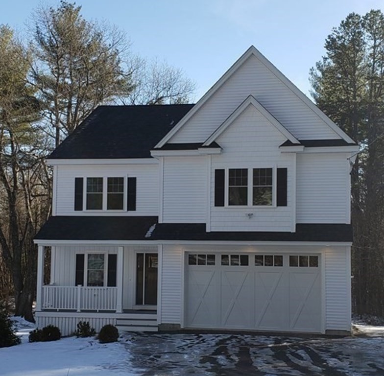 166 Pepperell Road Groton, MA 01450 - Photo 1 of 22 a front view of a house with a yard