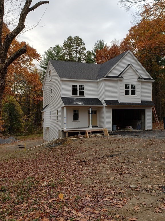 166 Pepperell Road Groton, MA 01450 - Photo 17 of 22 a view of a house with a yard