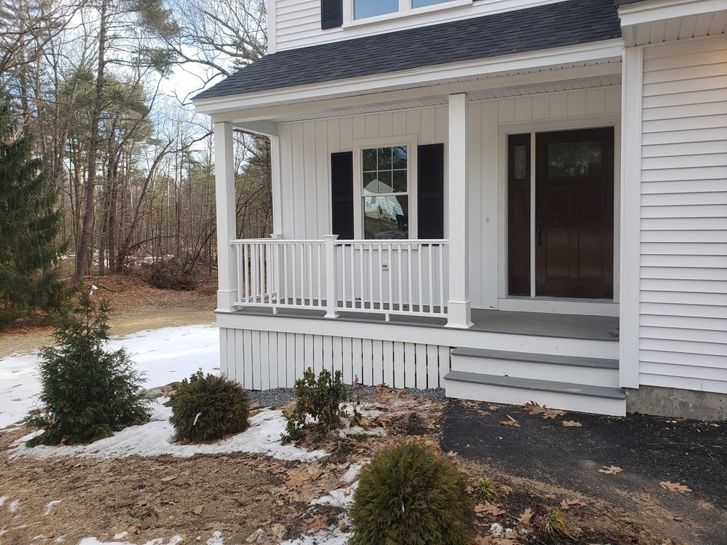 166 Pepperell Road Groton, MA 01450 - Photo 2 of 22 a view of porch with wooden floor