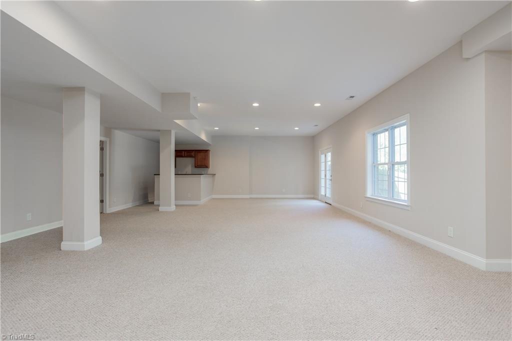 8606 Yvonne Court Oak Ridge, NC 27310 - Photo 15 of 21 2nd Floor master bedroom with wet bar