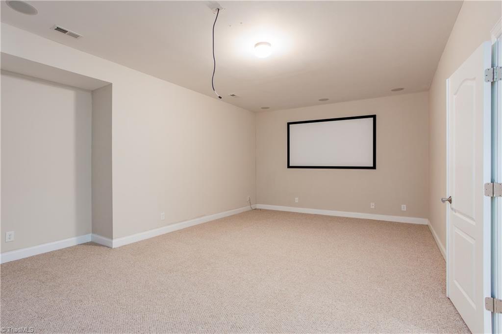 8606 Yvonne Court Oak Ridge, NC 27310 - Photo 17 of 21 Master walk in closet