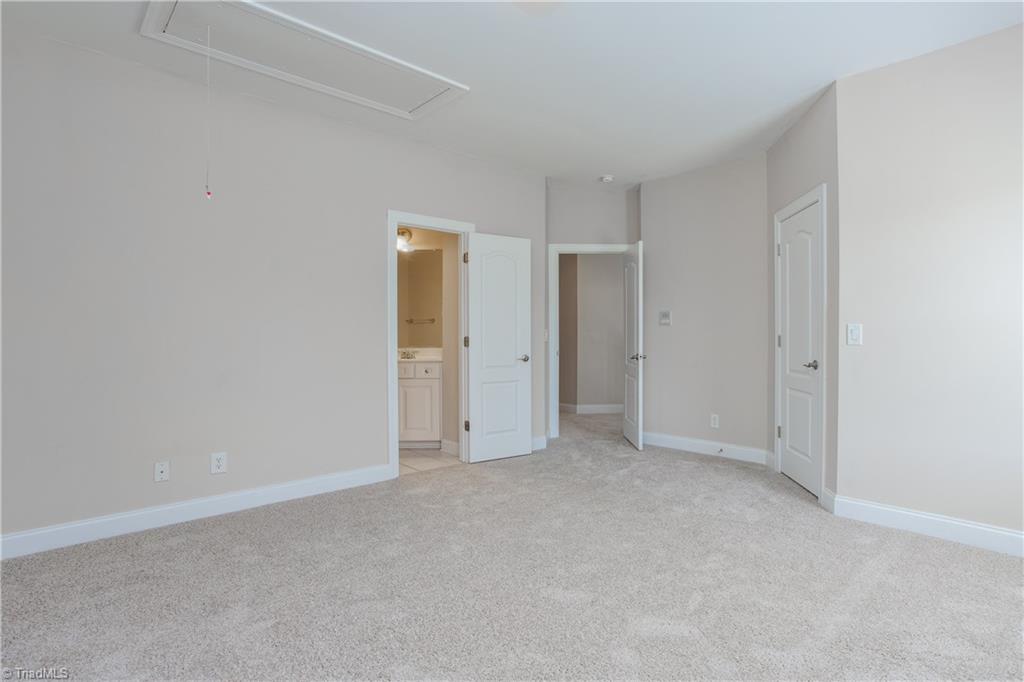 8606 Yvonne Court Oak Ridge, NC 27310 - Photo 18 of 21 Master bathroom
