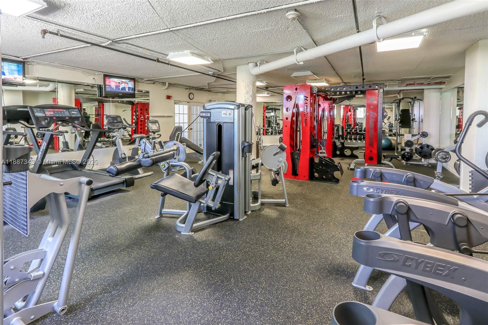 801 Brickell Bay Drive, Unit 1569 Miami, FL 33131 - Photo 18 of 19 a view of a room with gym equipment
