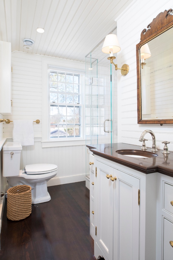 1 Twin Street Nantucket, MA 02554 - Photo 21 of 32 a bathroom with a double vanity sink toilet and a mirror