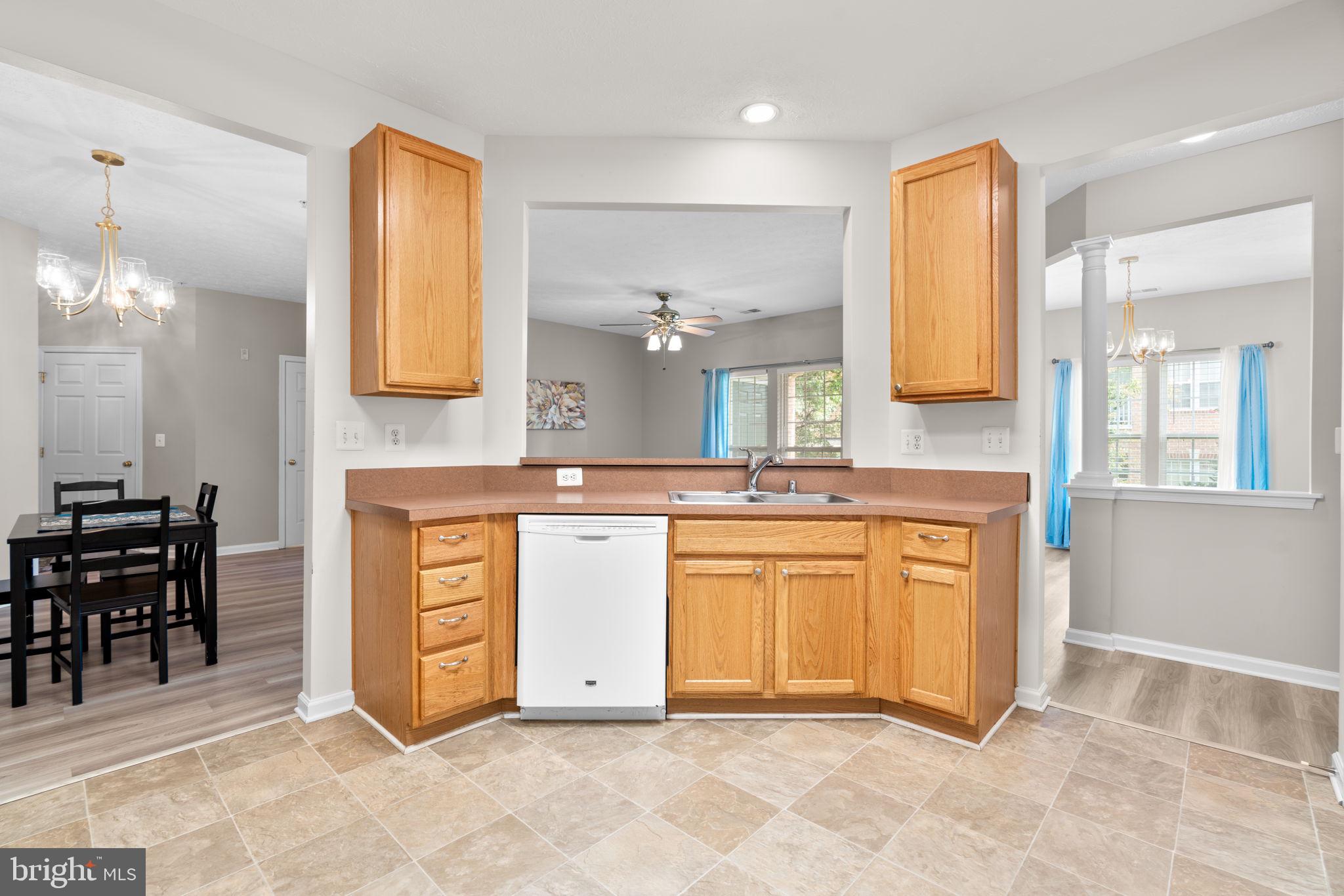 5215 Glenthorne Court, Unit 5215 Rosedale, MD 21237 - Photo 12 of 22 a bathroom with a sink a vanity and a mirror