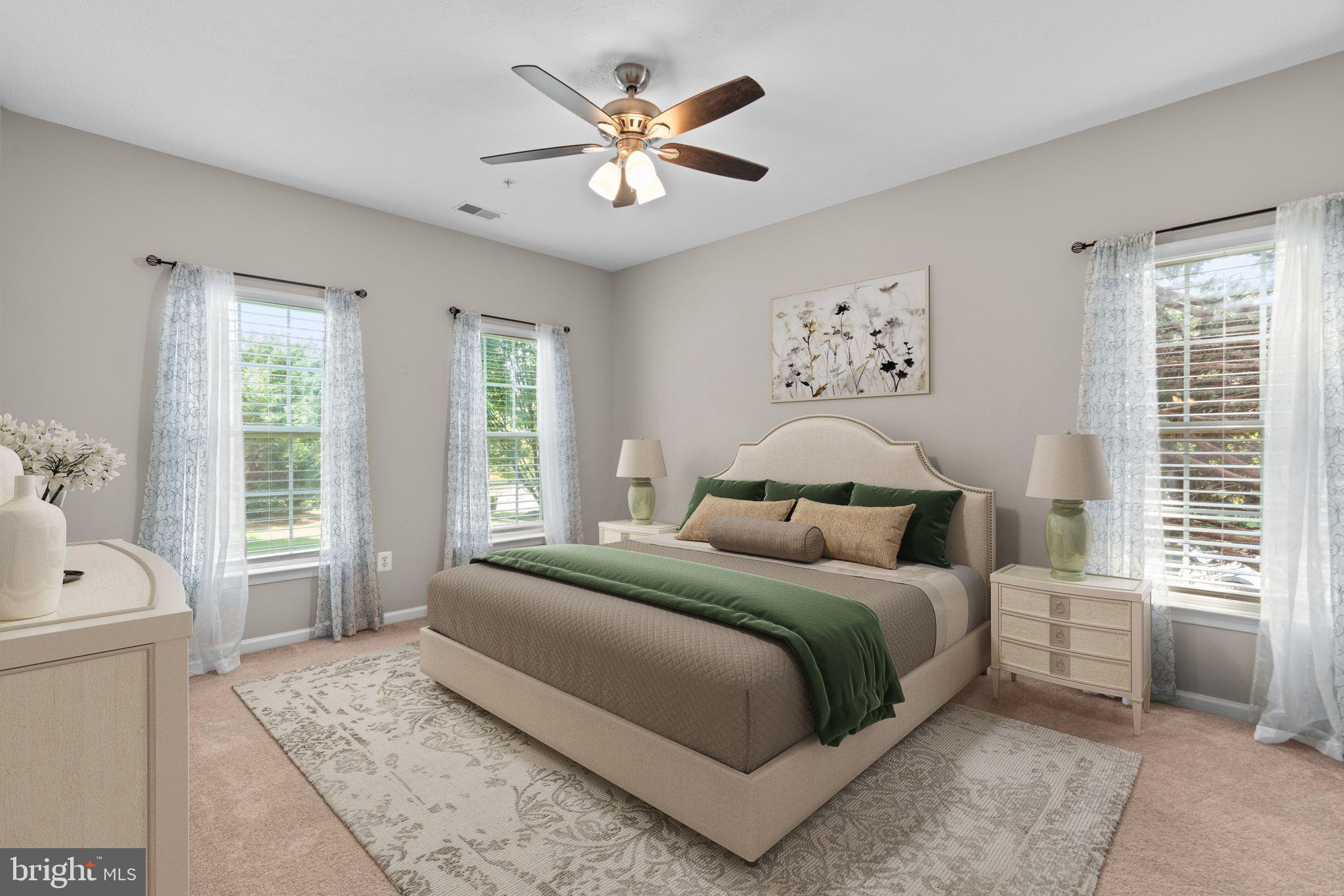 5215 Glenthorne Court, Unit 5215 Rosedale, MD 21237 - Photo 14 of 22 a bedroom with a large bed and a window