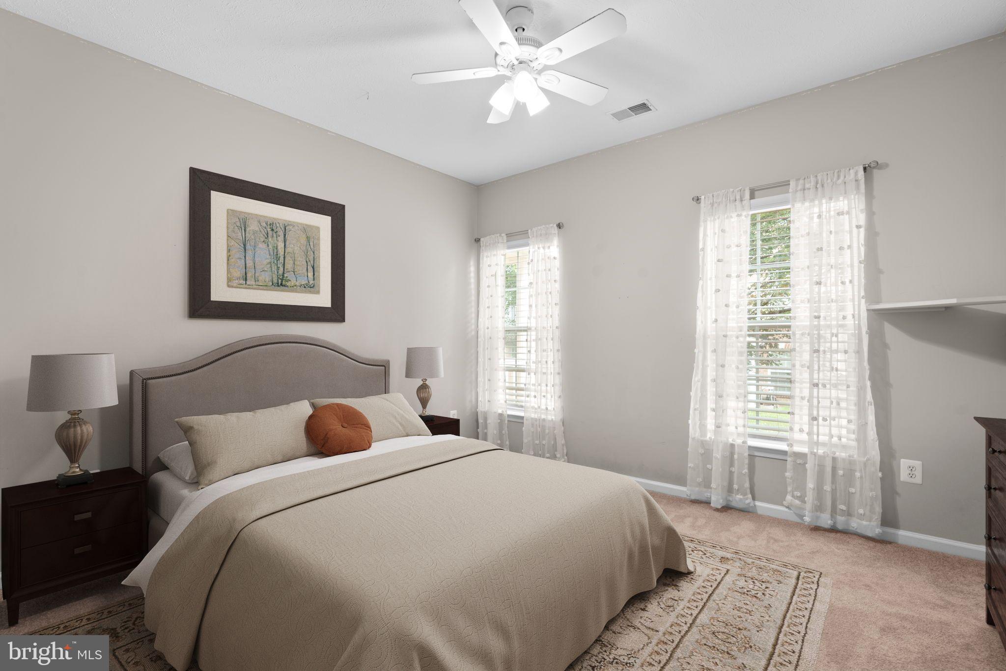 5215 Glenthorne Court, Unit 5215 Rosedale, MD 21237 - Photo 18 of 22 a bedroom with a large bed and a window