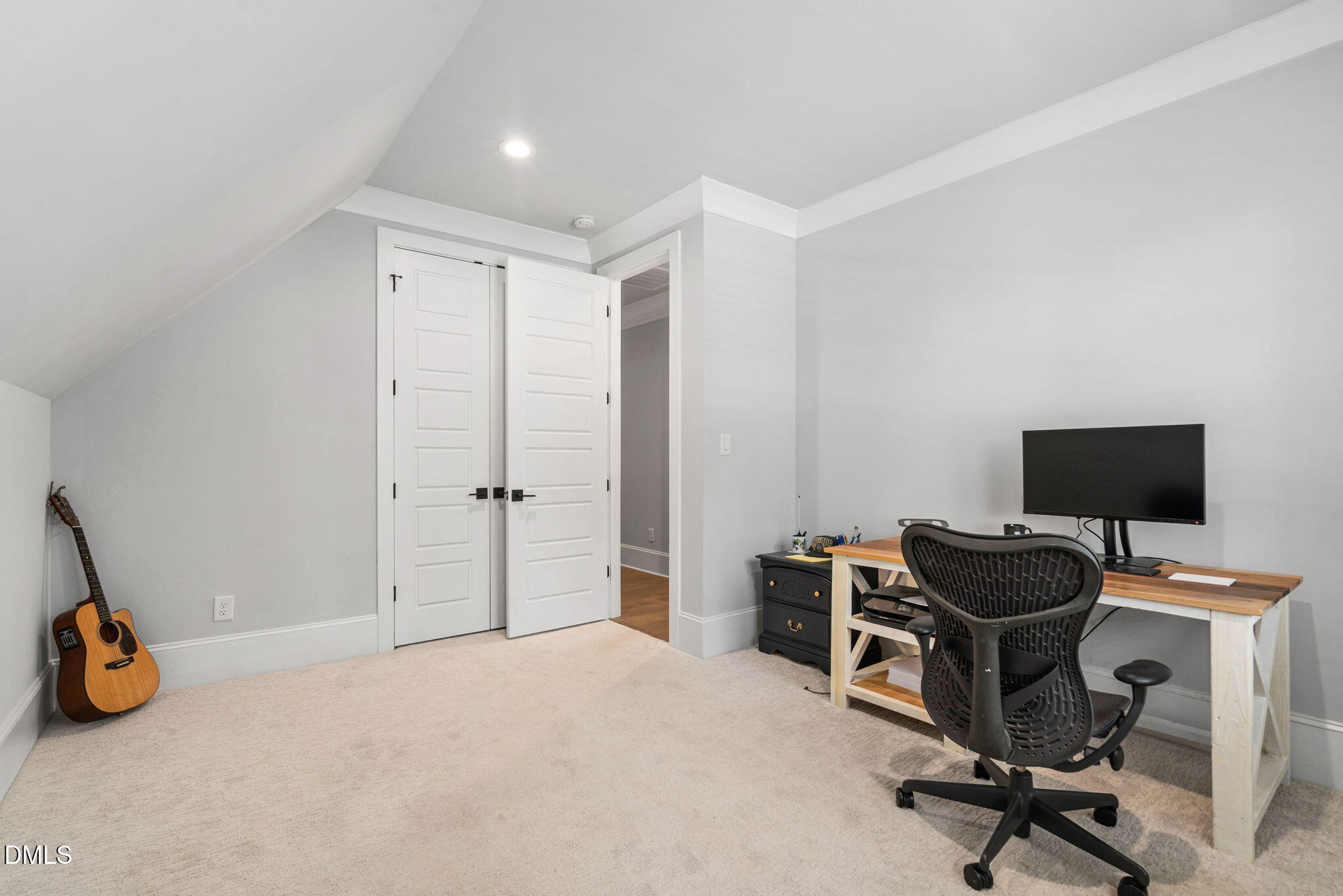 3417 Edgemont Drive Raleigh, NC 27612 - Photo 52 of 83 a view of a workspace with furniture and a window