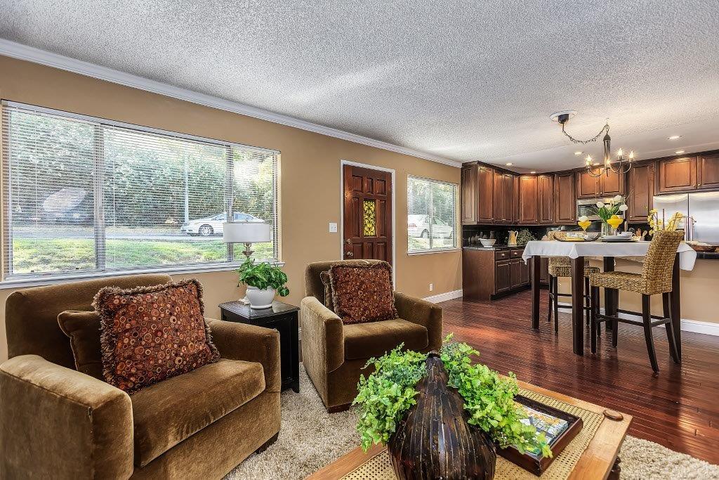 2329 Foothill Road, Unit 1 Pleasanton, CA 94588 - Photo 1 of 15 a living room with furniture and a large window