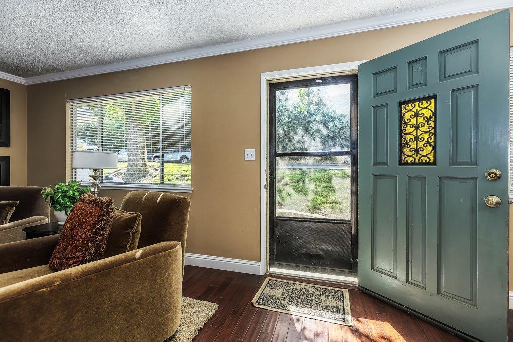 2329 Foothill Road, Unit 1 Pleasanton, CA 94588 - Photo 3 of 15 a living room with furniture and a window
