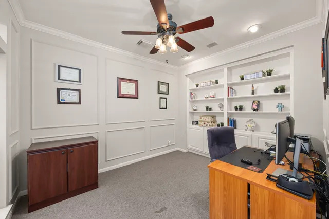 a room with furniture cabinets and window
