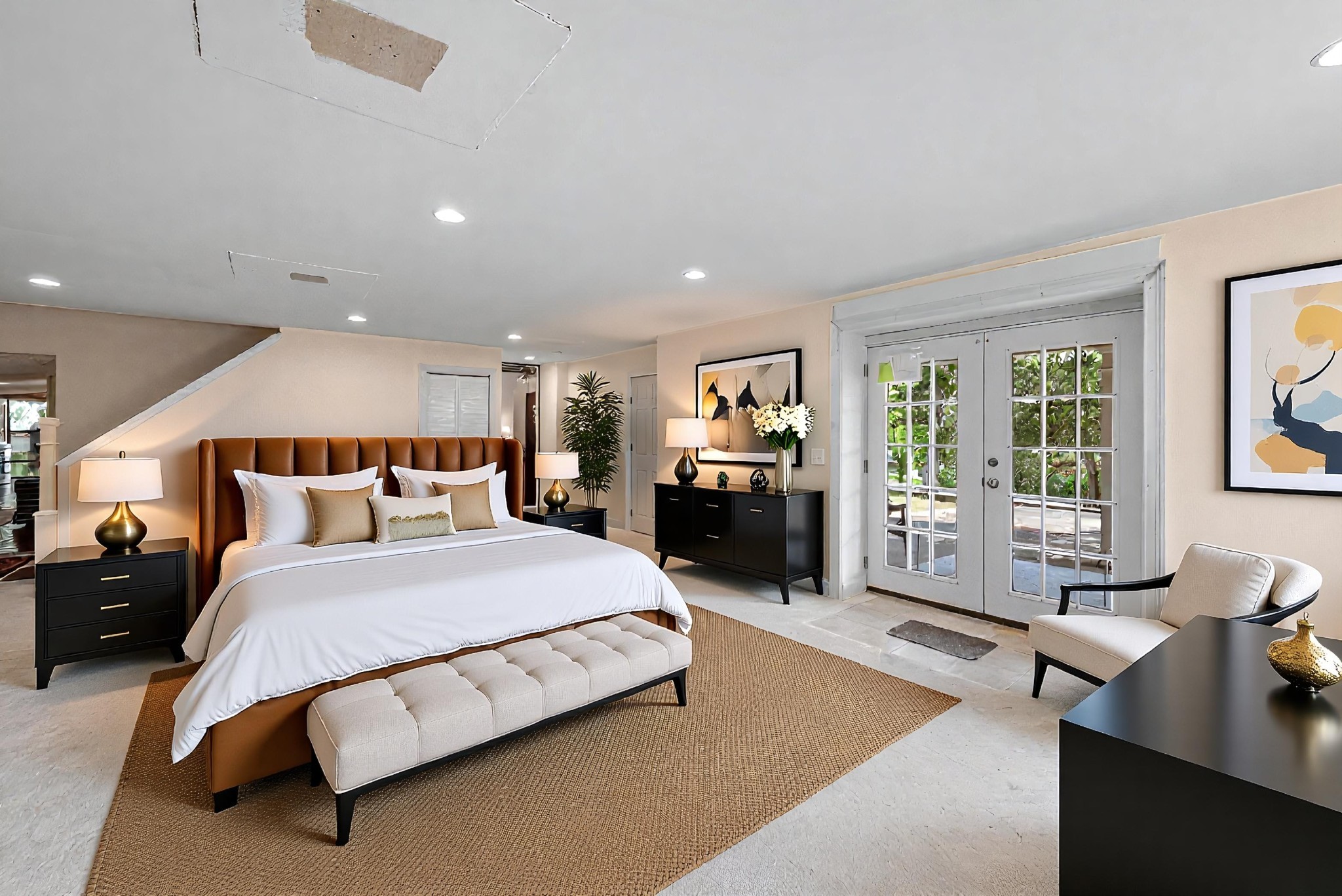 752 Florence Circle Madison, TN 37115 - Photo 25 of 59 a spacious bedroom with a large bed and a couch