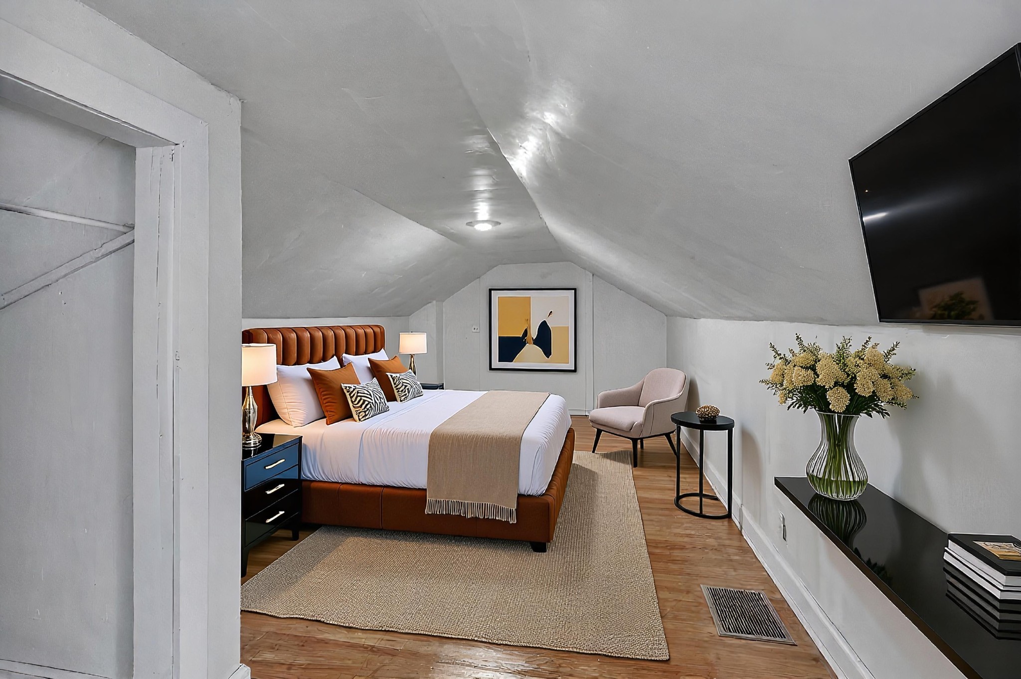 752 Florence Circle Madison, TN 37115 - Photo 29 of 59 a spacious bedroom with a bed and a flat screen tv