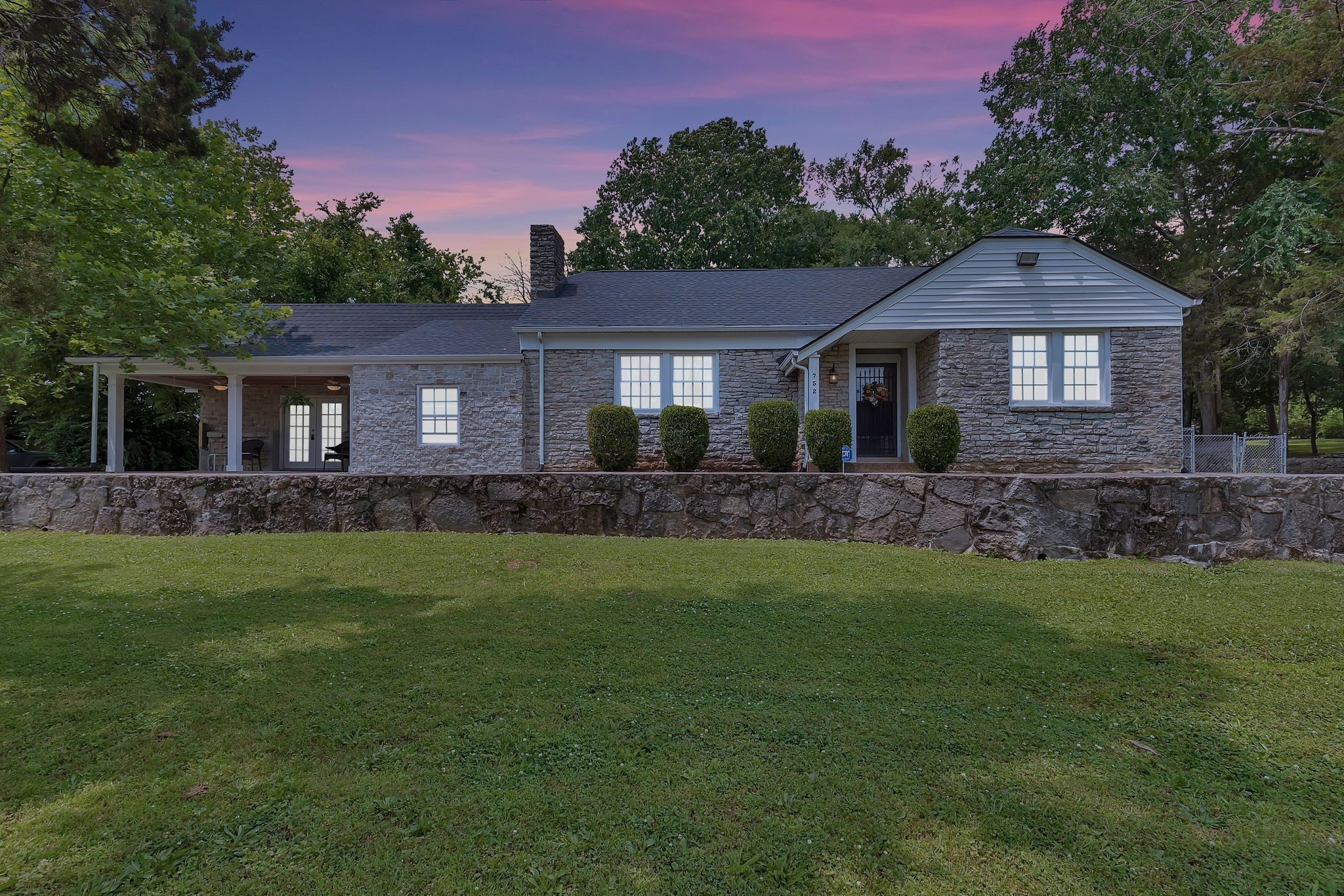 752 Florence Circle Madison, TN 37115 - Photo 32 of 59 a front view of a house with a garden