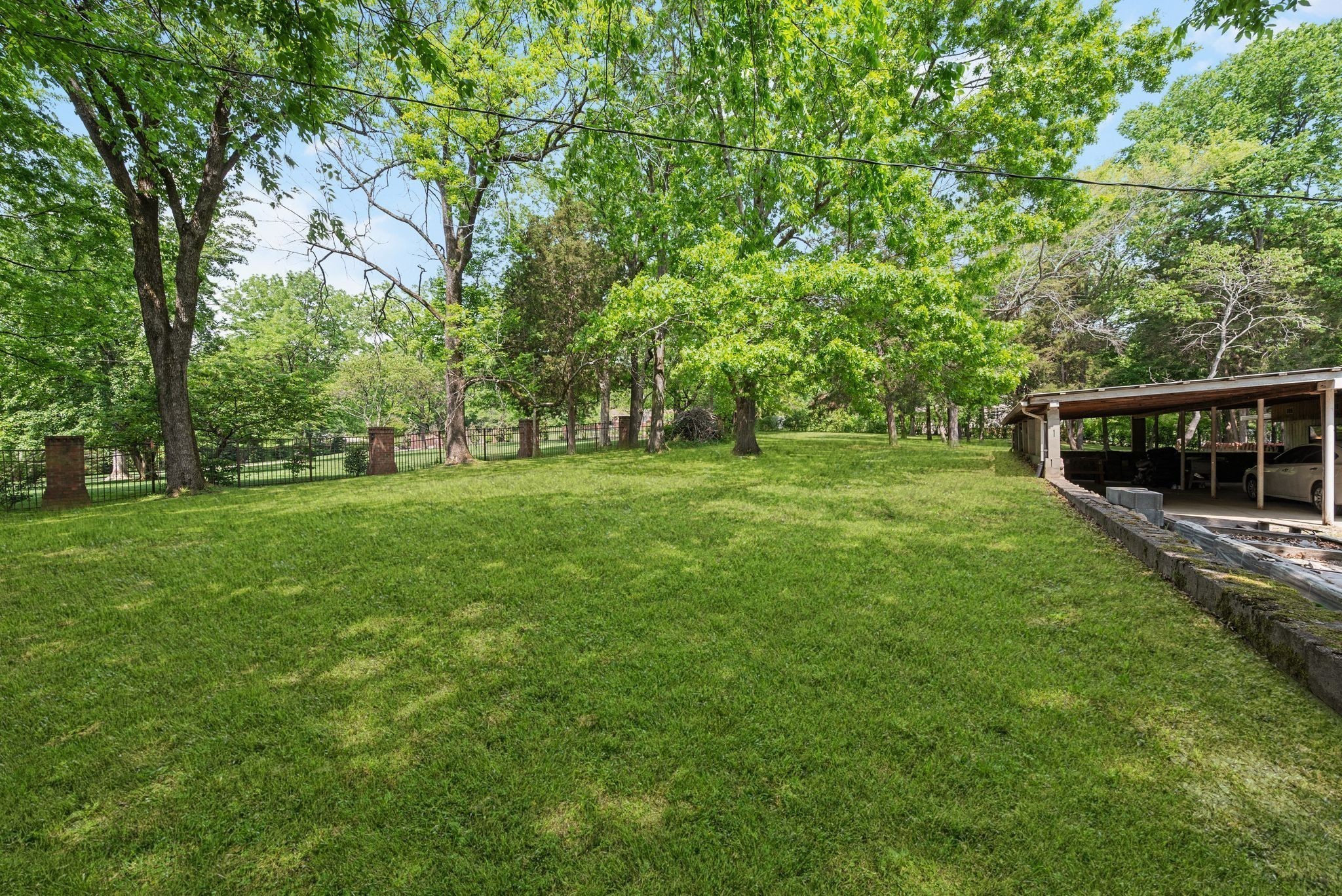 752 Florence Circle Madison, TN 37115 - Photo 38 of 59 a view of a grassy field with trees