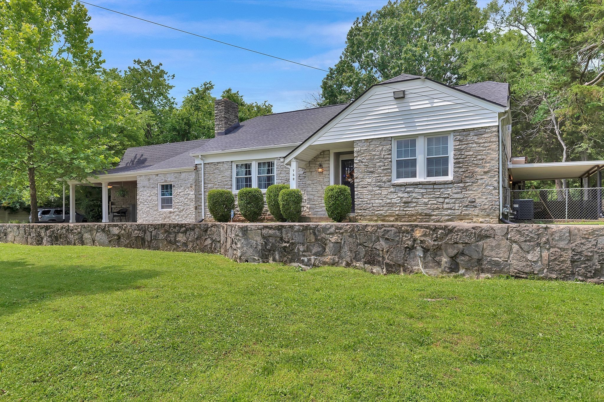 752 Florence Circle Madison, TN 37115 - Photo 39 of 59 a front view of house with yard and green space
