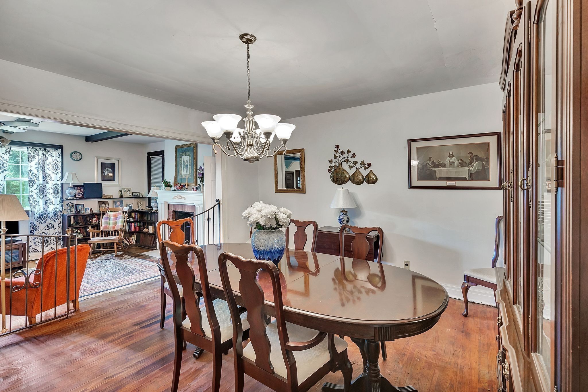 752 Florence Circle Madison, TN 37115 - Photo 9 of 59 a dining room with furniture a chandelier and wooden floor