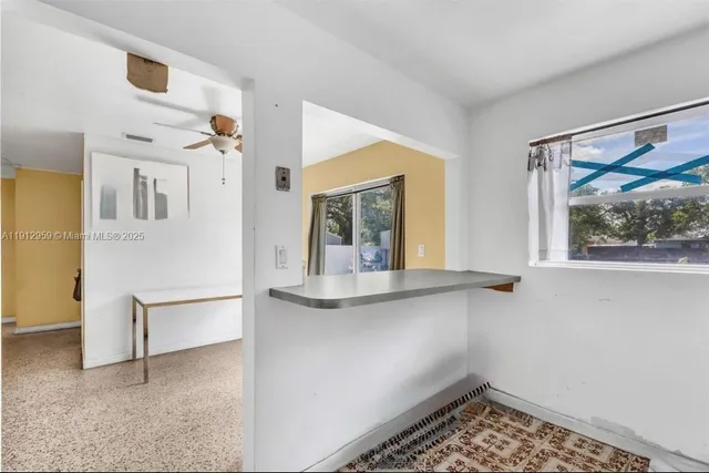 a bedroom with a bed and furniture